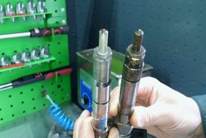 Новая и негодная форсунки Замена форсунки