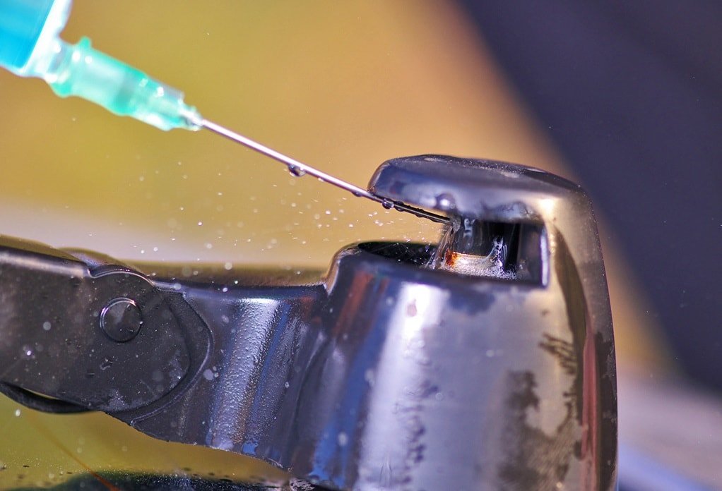 Прочистка и промывка шприцом Прочистка форсунок